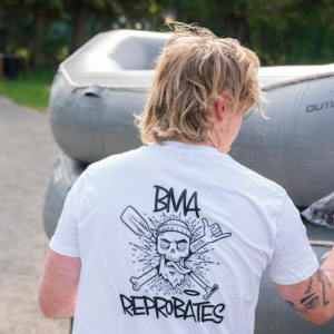 Man wearing white bearded men adventures reprobates t shirt.